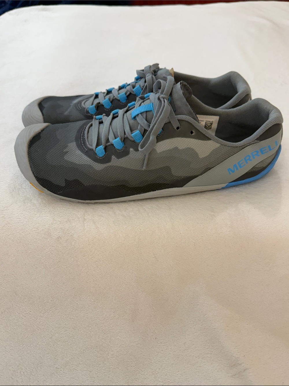 Merrell Barefoot Multi-Gray Camouflage Sneakers with blue accents.
